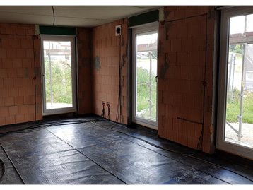 09 - Innenansicht geschlossener Rohbau eines schlüsselfertigen Massivhauses in Vilsbiburg