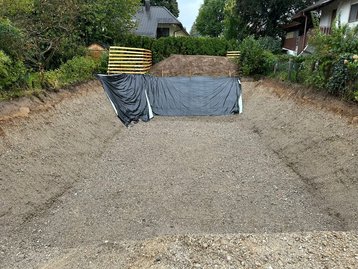 Erdarbeiten eines unterkellerten massiven Einfamilienhauses in München